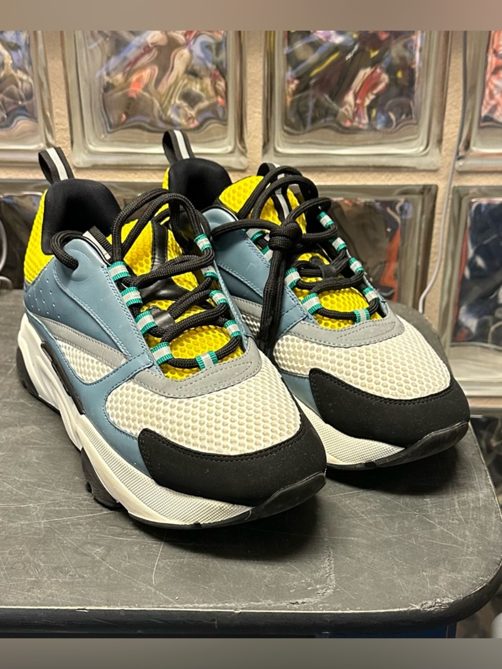 Dior Men's B22 sneakers in a blue, yellow, and white colorway